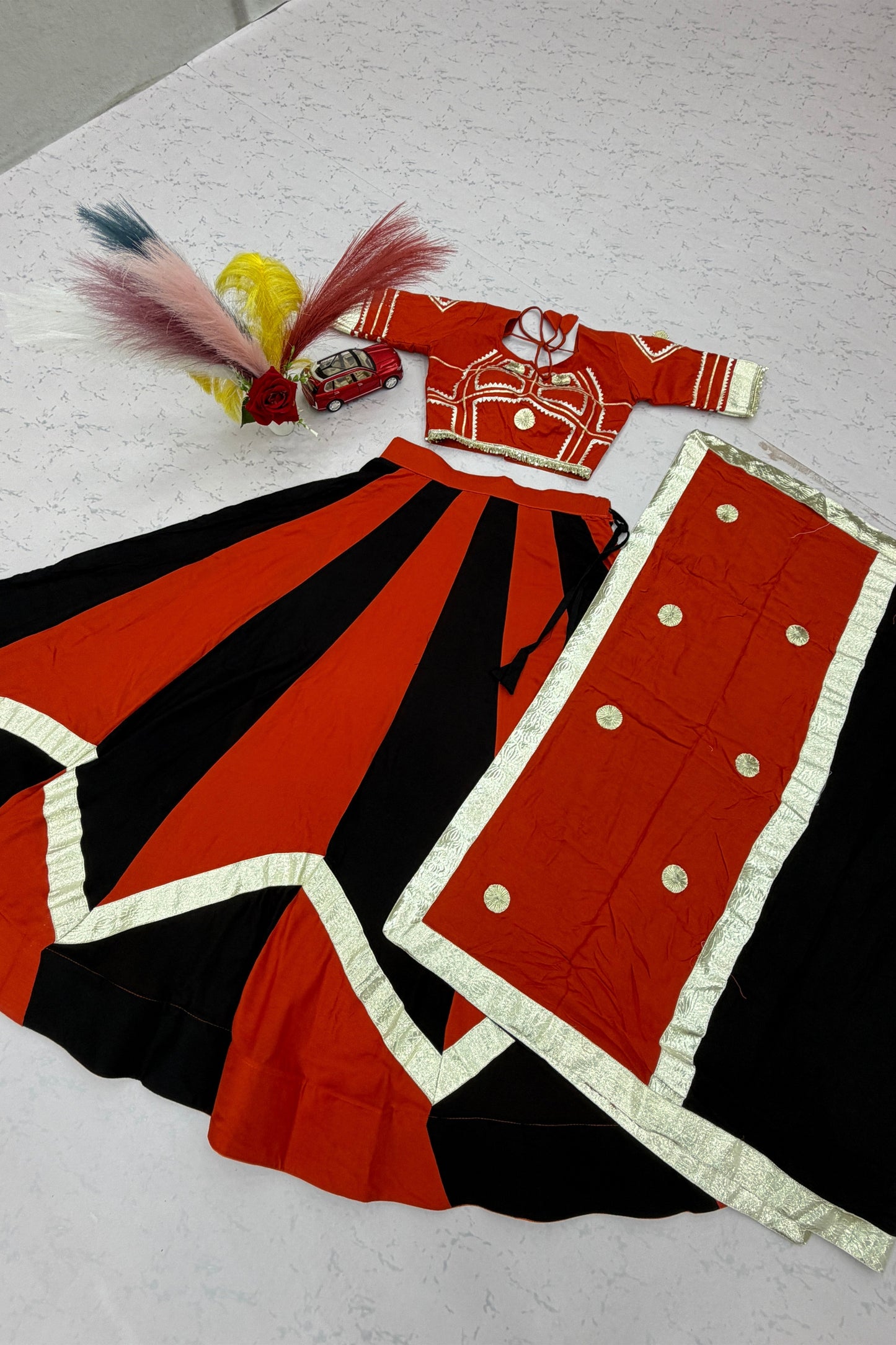 Trendy Black and Orange Cotton Designer Lehenga Choli Set with Gotta Patti Lace Work