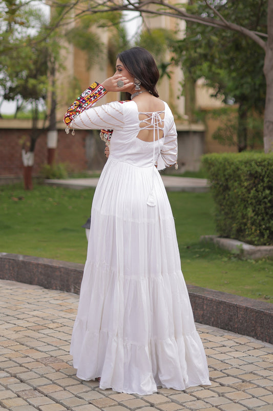 Wonderful White Rayon Embroidered Mirror Work Navratri Gown for Women