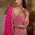 Elegant Rani Pink and Orange Georgette Heavy Embroidered Designer Salwar Suit with Dupatta