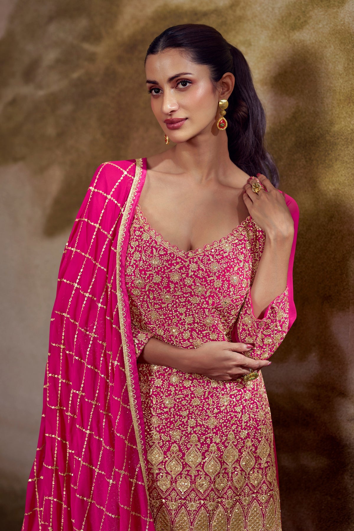 Elegant Rani Pink and Orange Georgette Heavy Embroidered Designer Salwar Suit with Dupatta
