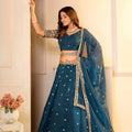 Captivating Teal Blue Crunchy Silk Designer Lehenga Choli with Golden Embroidery Work and Dupatta