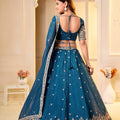 Captivating Teal Blue Crunchy Silk Designer Lehenga Choli with Golden Embroidery Work and Dupatta
