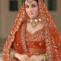 Exquisite Rust Orange Premium Silk Bridal Lehenga Choli with Heavy Embroidery Work and Dupatta