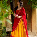 Vibrant Yellow and Red Kanchipuram Silk Designer Lehenga Choli with Gold Zari Weaving Work