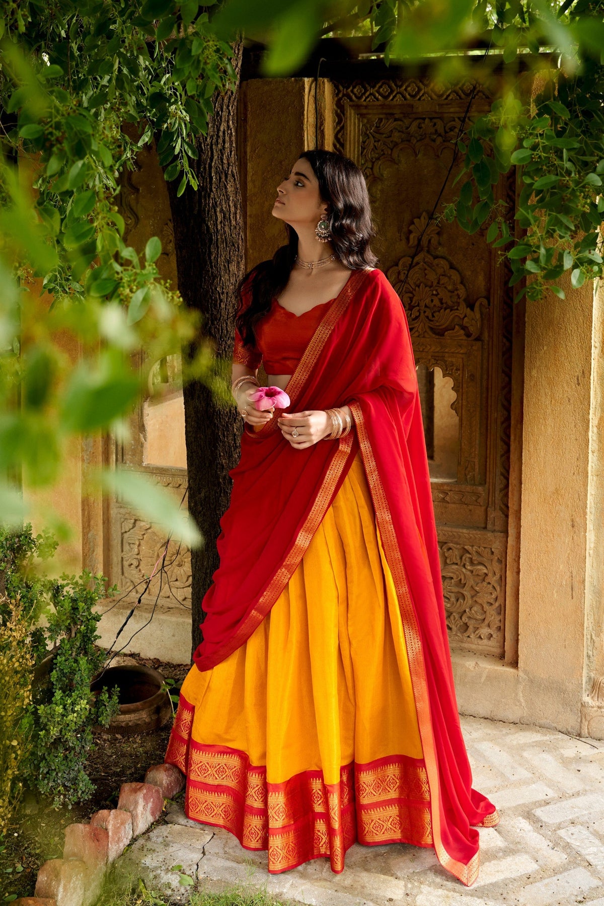 Vibrant Yellow and Red Kanchipuram Silk Designer Lehenga Choli with Gold Zari Weaving Work