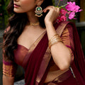 Captivating Orange and Maroon Kanchipuram Silk Designer Lehenga Choli with Gold Zari Weaving Work