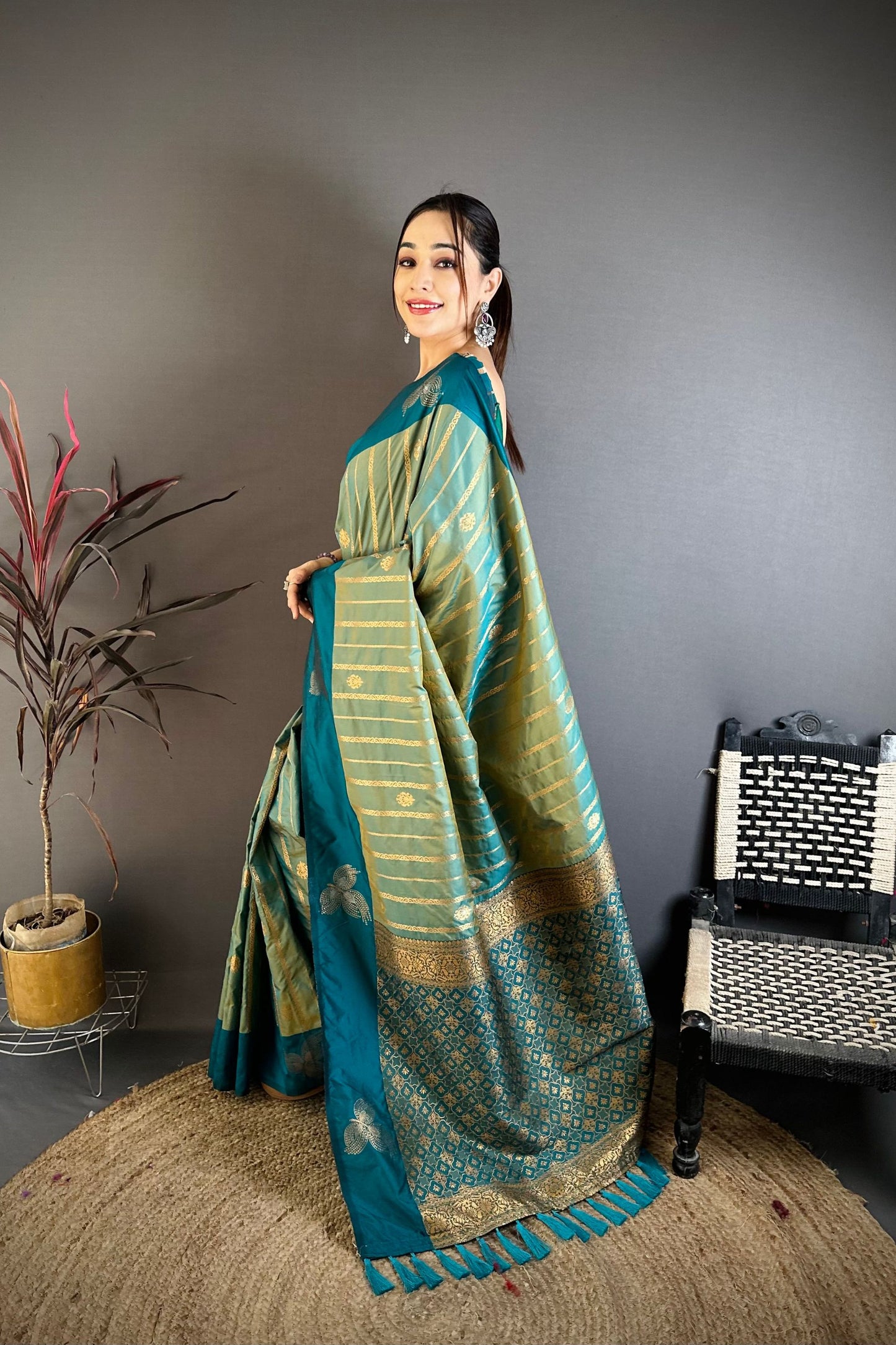 Teal Blue Banarasi Silk Saree with Rich Gold Zari Weaving Tassel Pallu