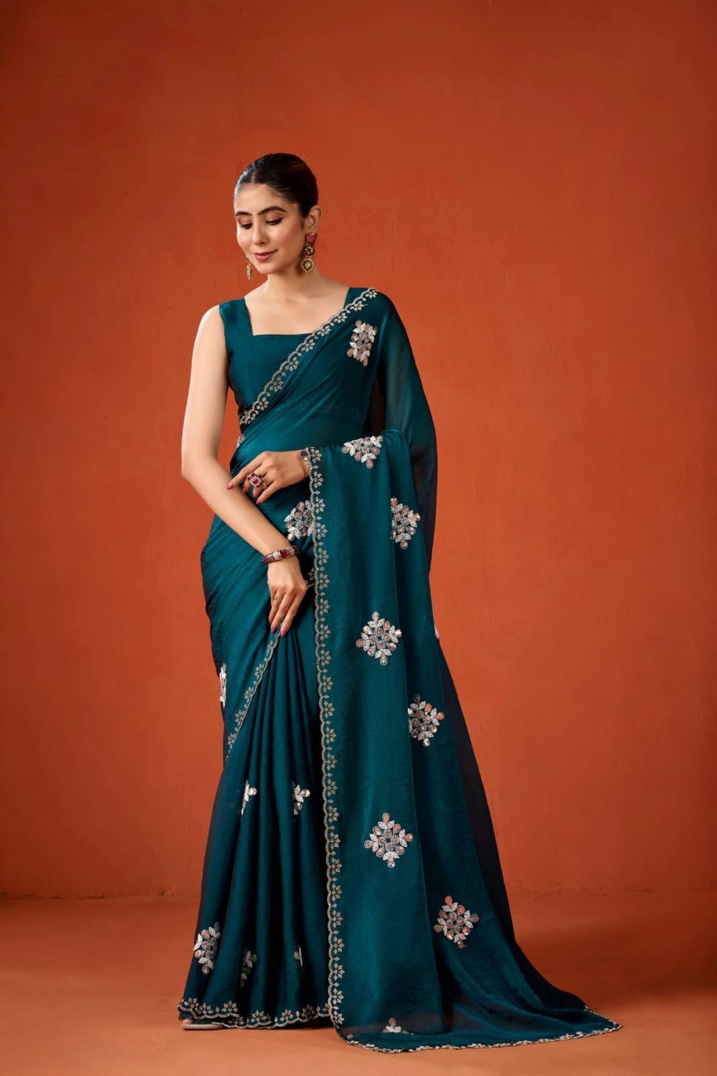 Dark Teal Embroidered Georgette Saree Floral Motifs Designer Border