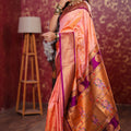 Peach Kanjivaram Silk Saree with Gold Zari Border Butti Work