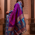 Magenta Paithani Silk Saree with Contrast Teal Blue Zari Border