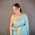 Sky Blue Linen Silk Saree with Golden Zari Border Tassel Pallu