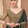 Dark Green Silk Saree with Golden Ombre Finish Heavy Embroidered Border