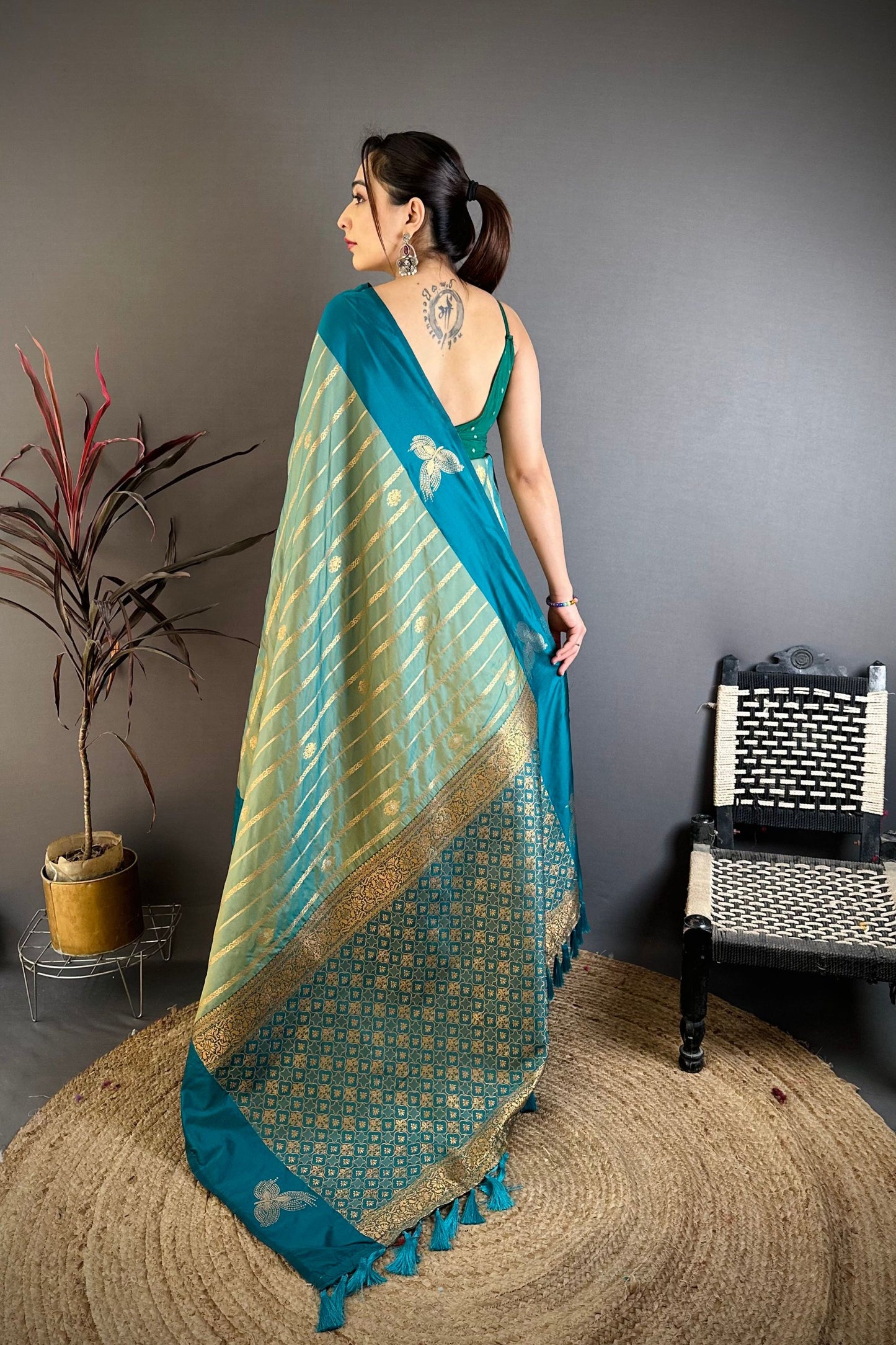 Teal Blue Banarasi Silk Saree with Rich Gold Zari Weaving Tassel Pallu