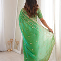 Luxury Parrot Green Organza Silk Saree with Golden Embroidered Border