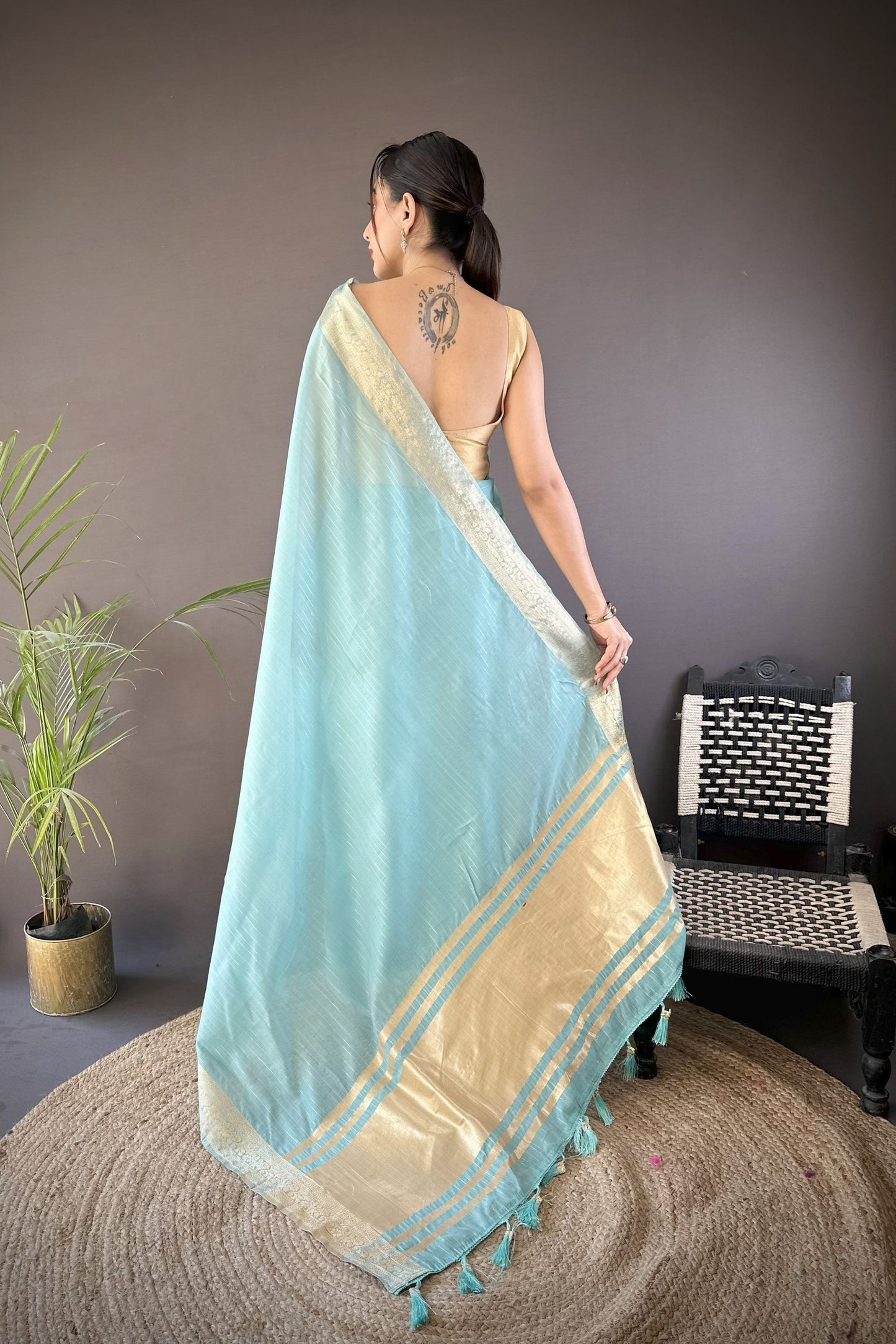 Sky Blue Linen Silk Saree with Golden Zari Border Tassel Pallu