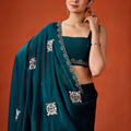 Dark Teal Embroidered Georgette Saree Floral Motifs Designer Border