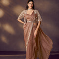 Designer Brown Embroidered Georgette Saree and Sleeveless Blouse