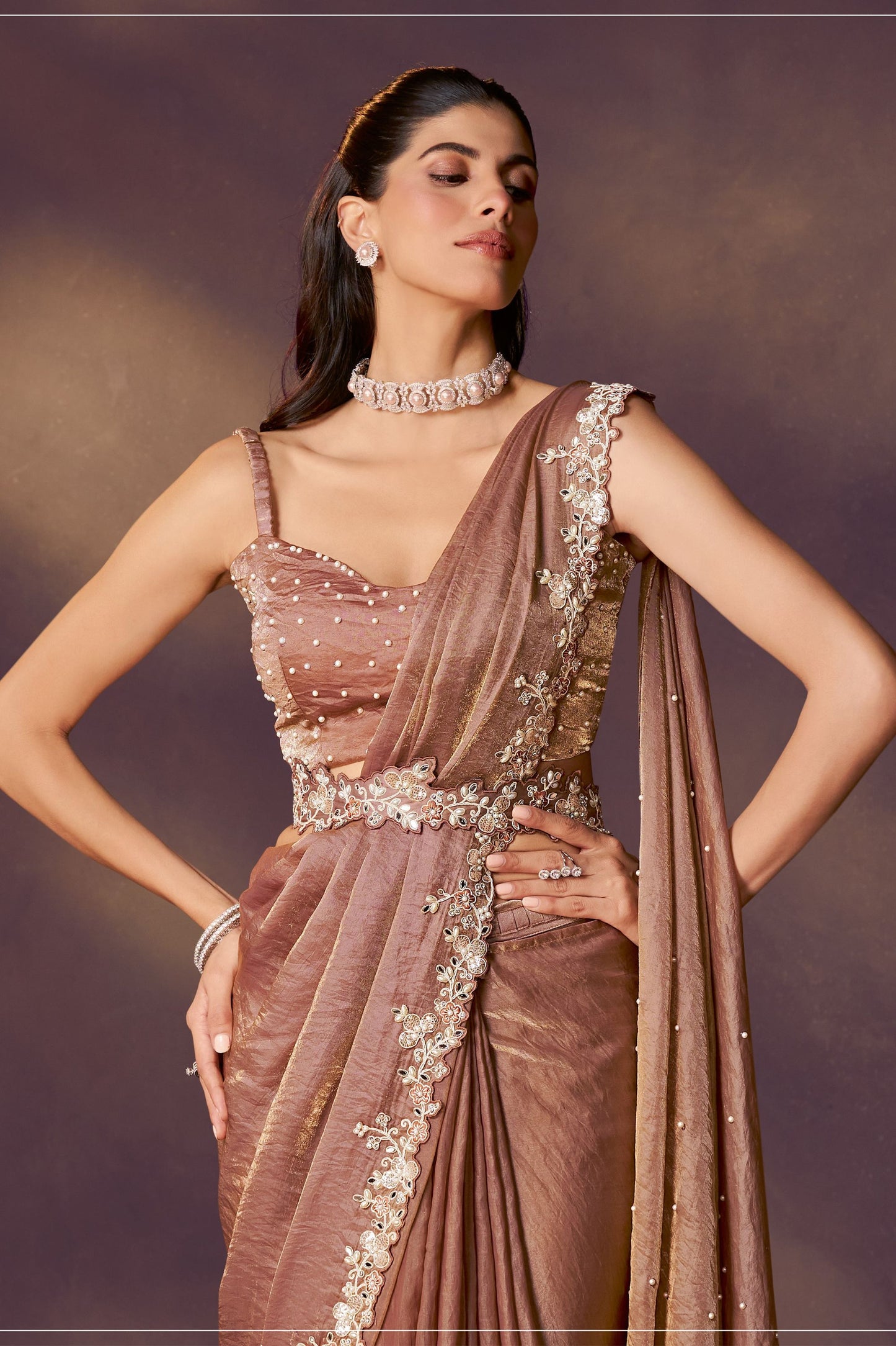 Designer Brown Embroidered Georgette Saree and Sleeveless Blouse