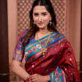 Rich Wine Red Paithani Silk Saree with Contrast Teal Blue Zari Border