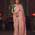 Pink Silk Saree with Embroidered Border and Teal Designer Blouse