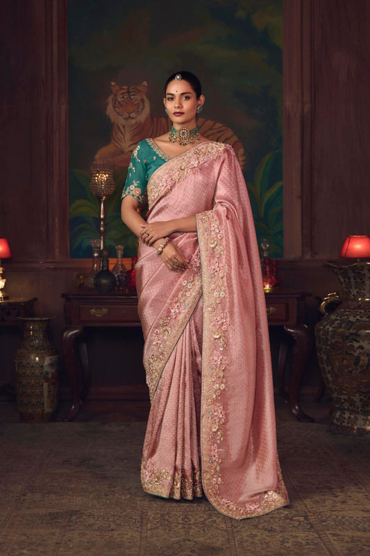 Pink Silk Saree with Embroidered Border and Teal Designer Blouse