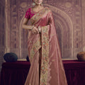 Pink Silk Saree with Heavy Embroidered Zari Border and Contrast Magenta Blouse