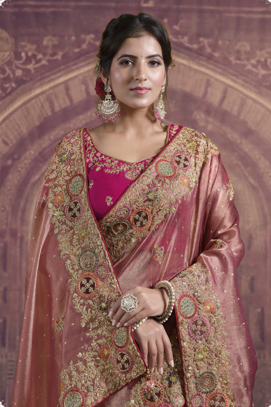 Pink Silk Saree with Heavy Embroidered Zari Border and Contrast Magenta Blouse