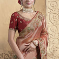 Peach Silk Saree with Golden Zari Embroidery Red Blouse