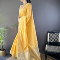 Mustard Yellow Linen Silk Saree with Golden Zari Border Tassel Pallu