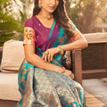 Magenta Silk Saree with Teal Green Contrast Border Floral Zari Work