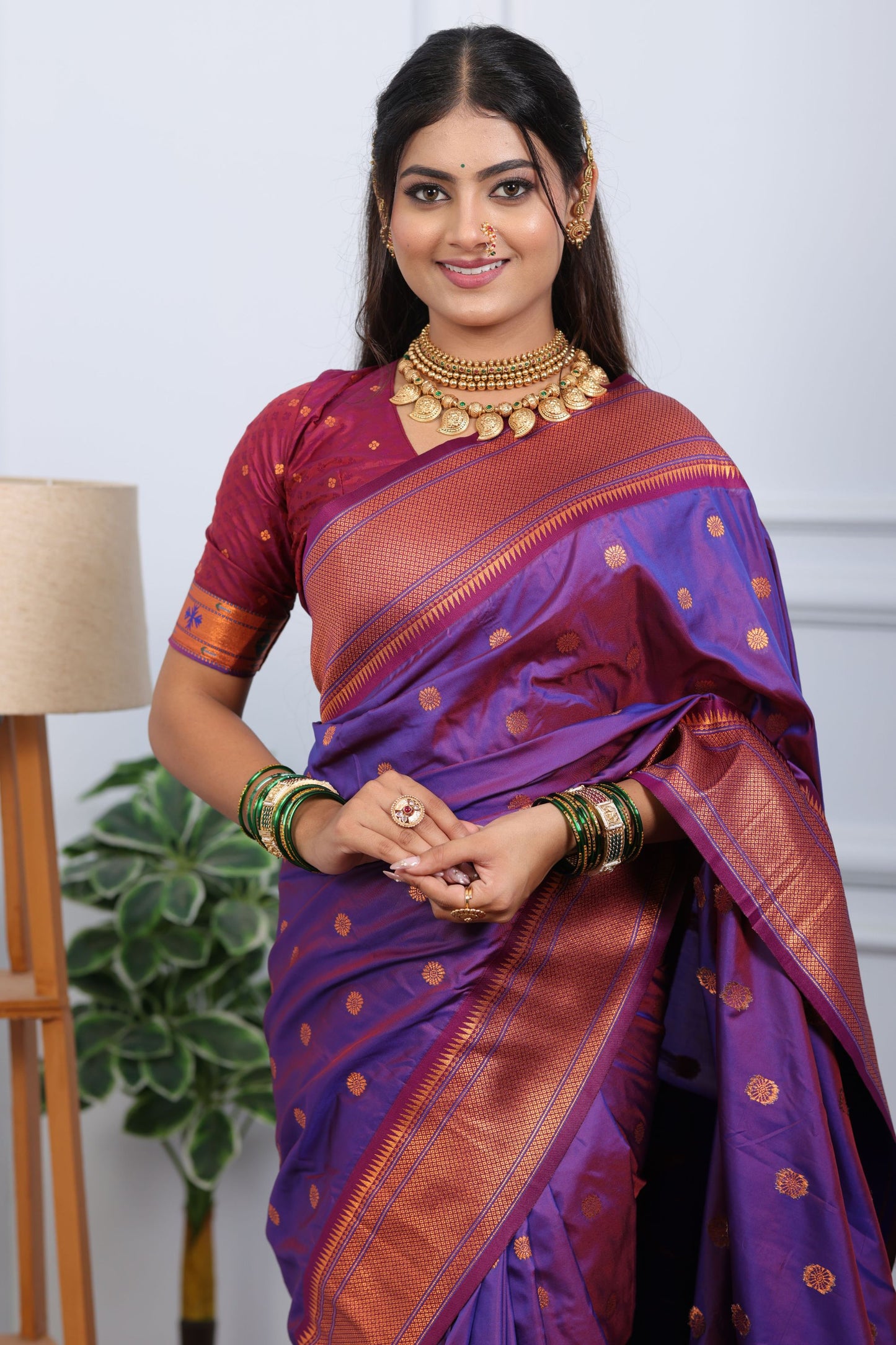 Purple Kanjivaram Silk Saree with Gold Zari Border Butti Work