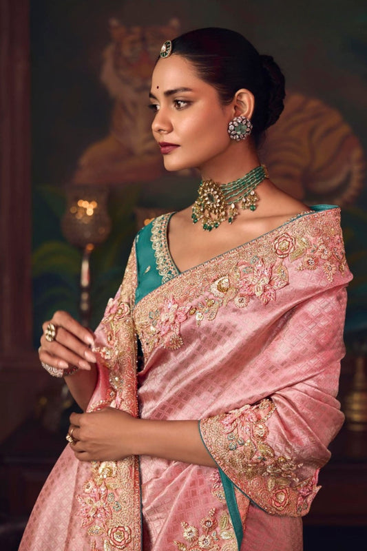 Pink Silk Saree with Embroidered Border and Teal Designer Blouse