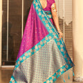 Magenta Silk Saree with Teal Green Contrast Border Floral Zari Work
