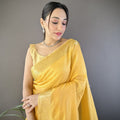 Mustard Yellow Linen Silk Saree with Golden Zari Border Tassel Pallu