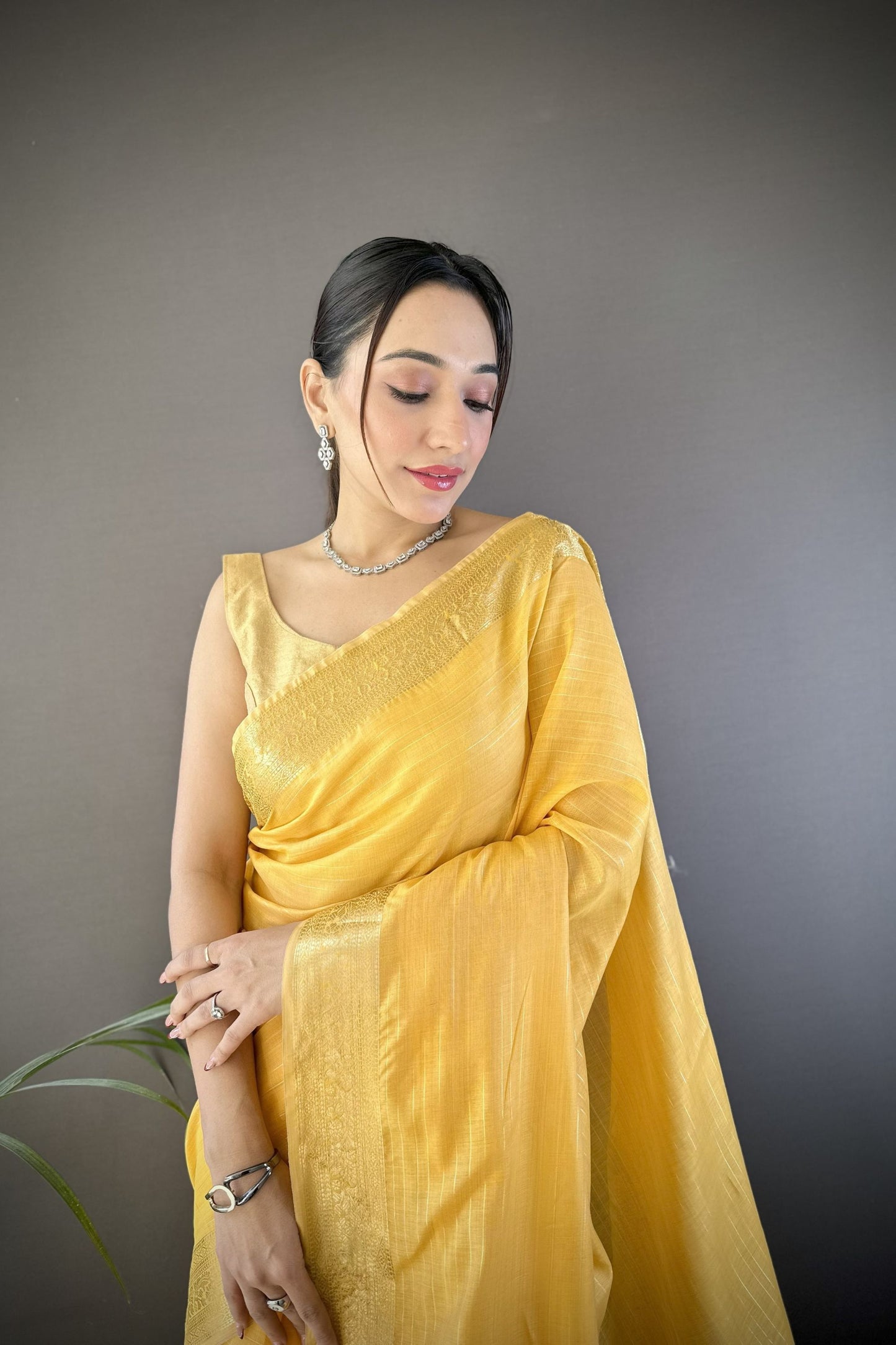 Mustard Yellow Linen Silk Saree with Golden Zari Border Tassel Pallu