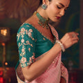 Pink Silk Saree with Embroidered Border and Teal Designer Blouse