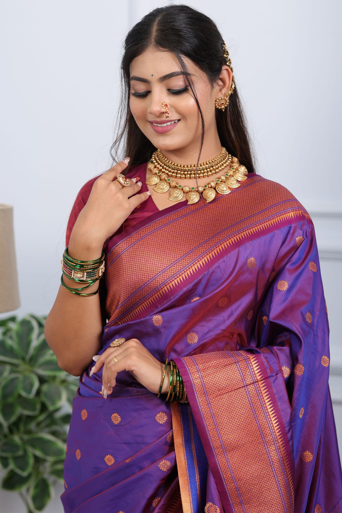 Purple Kanjivaram Silk Saree with Gold Zari Border Butti Work