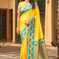 Yellow Silk Saree with Teal Green Contrast Border Floral Zari Work 