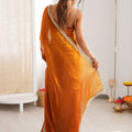 Orange Organza Silk Saree with Designer Golden Lace Border