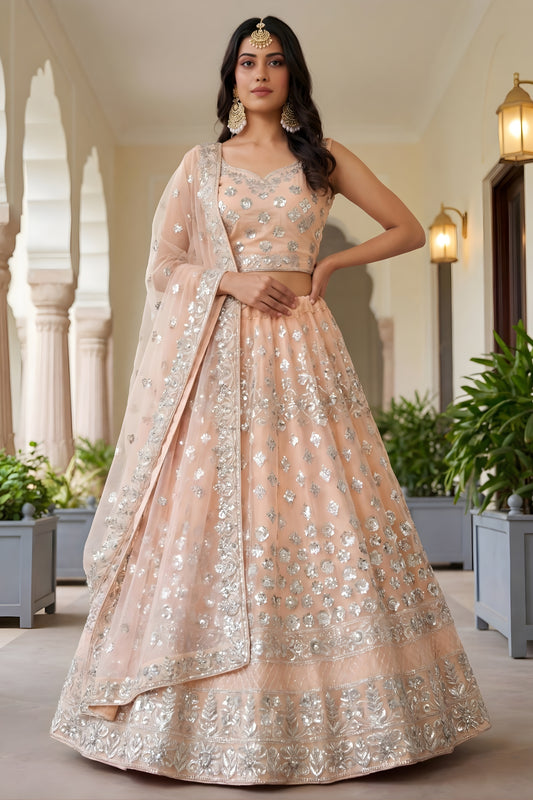 Wonderful Peach Embroidered Net Lehenga Choli with Dupatta for Wedding