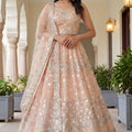 Wonderful Peach Embroidered Net Lehenga Choli with Dupatta for Wedding