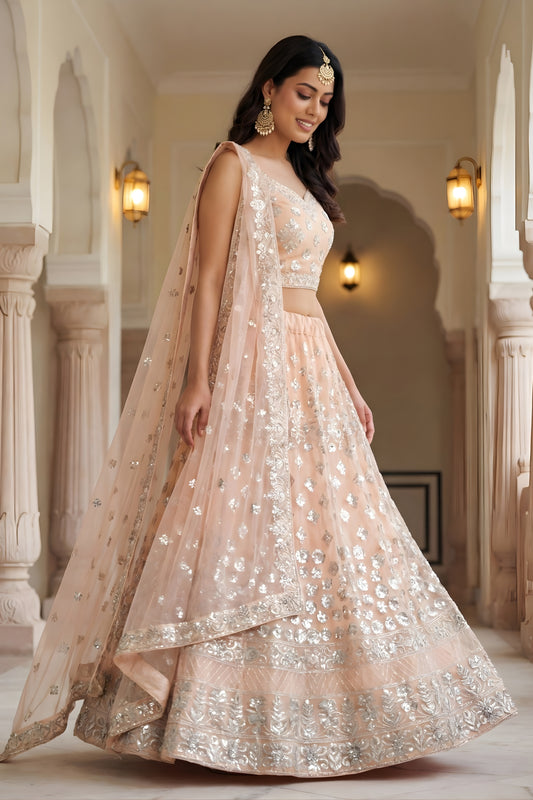Wonderful Peach Embroidered Net Lehenga Choli with Dupatta for Wedding