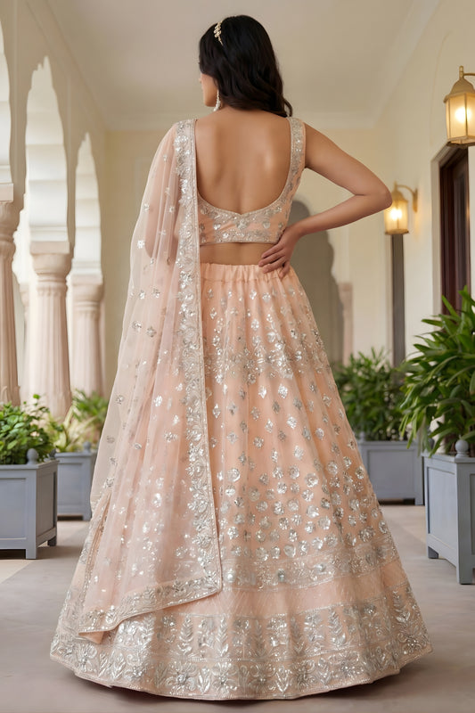 Wonderful Peach Embroidered Net Lehenga Choli with Dupatta for Wedding