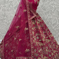Stylish Rani Pink Silk Heavy Embroidered Bridal Lehenga Choli with Net Dupatta for Wedding