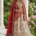 Fancy Cream Silk Heavy Embroidered Bridal Lehenga Choli with Red Net Dupatta for Wedding