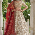 Fancy Cream Silk Heavy Embroidered Bridal Lehenga Choli with Red Net Dupatta for Wedding