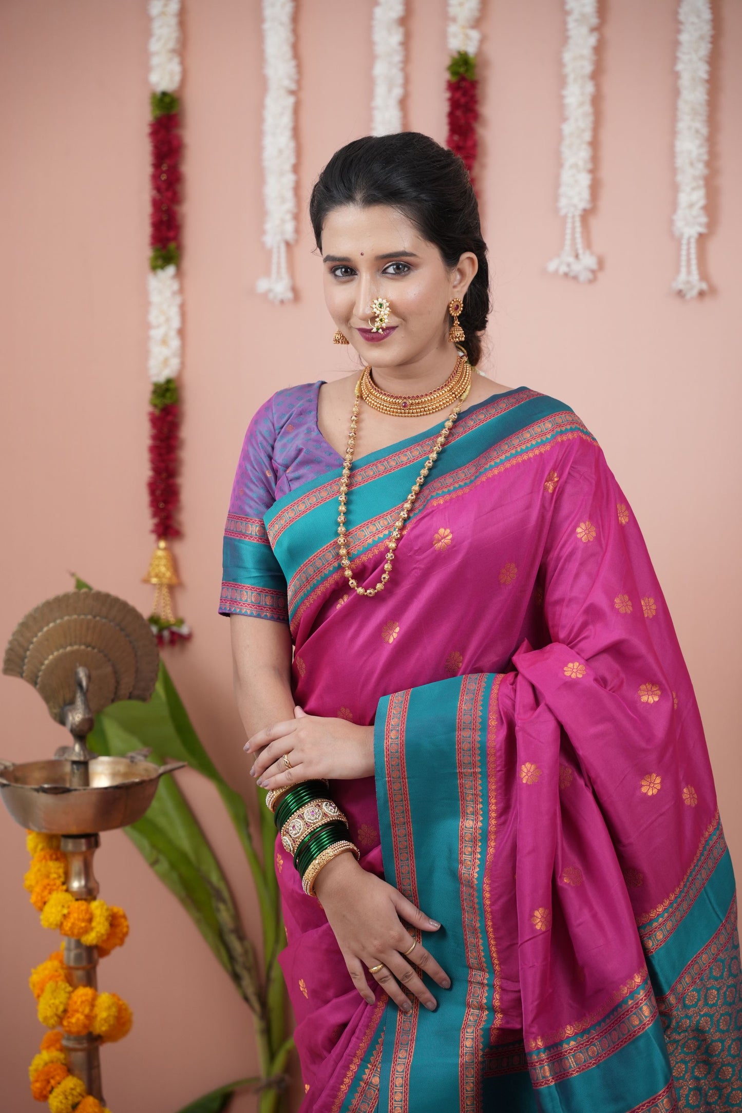 Rani Pink Silk Saree with Teal Blue Woven Border Traditional Design