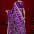 Purple Bandhej Print Festive Saree with Golden Border Matching Blouse