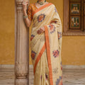 Beige Printed Linen Silk Saree with Floral Design and Orange Border