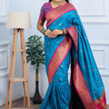Teal Blue Kanjivaram Silk Saree with Pink Border Gold Zari Butti Work